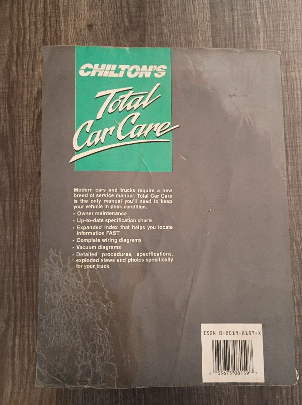 Ford Black and Teal Automotive Repair Manual Cover